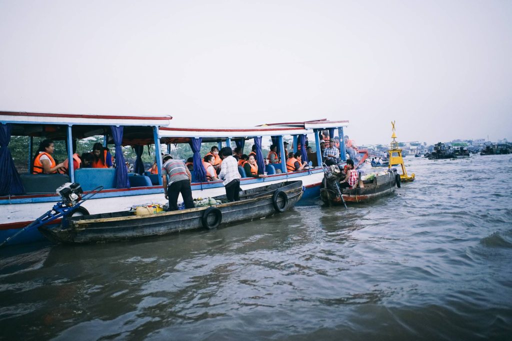 boats gliding on an An Giang river — Cần Thơ – An Giang Adventure, mekongtodo real Mekong Delta tour