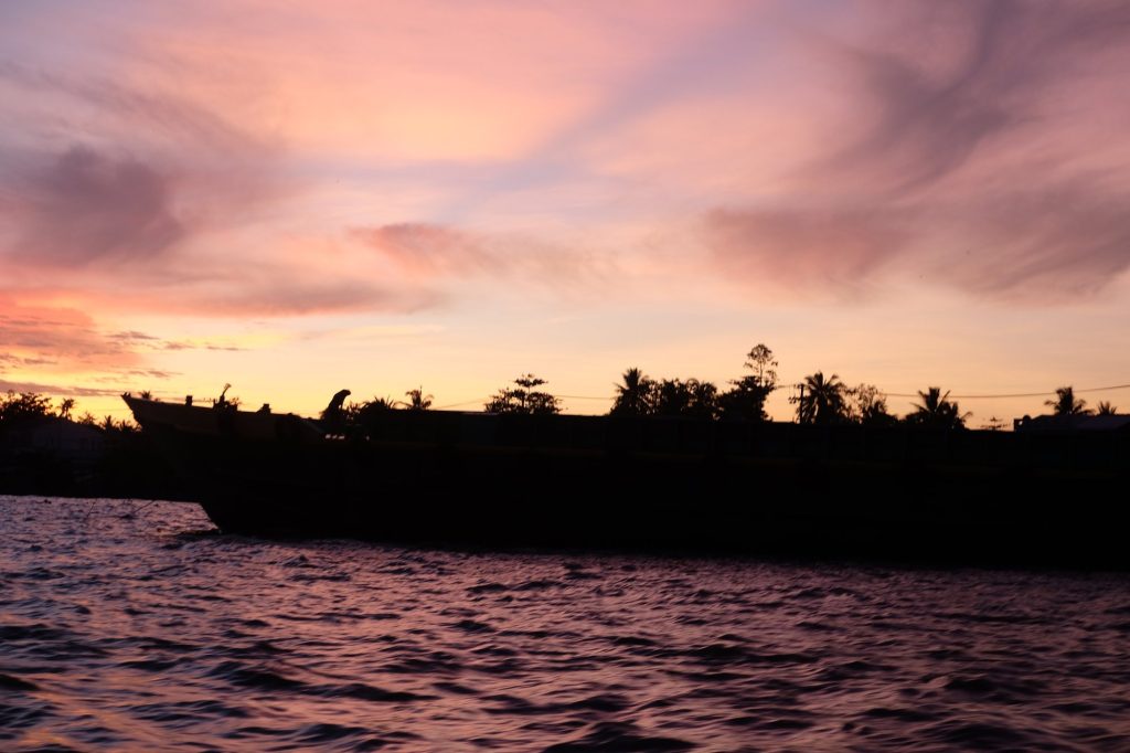 sunset over the Mekong water — Cần Thơ – An Giang Adventure, mekongtodo real Mekong Delta tour