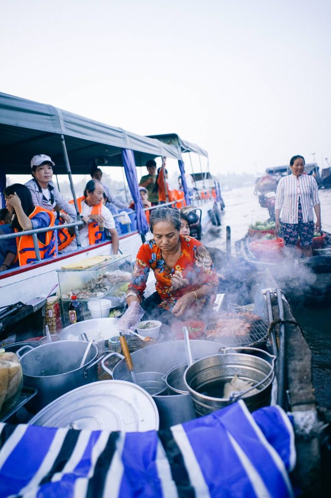 breakfast served onboard at sunrise — Cai Rang Floating Market at Dawn, mekongtodo real Mekong Delta tour