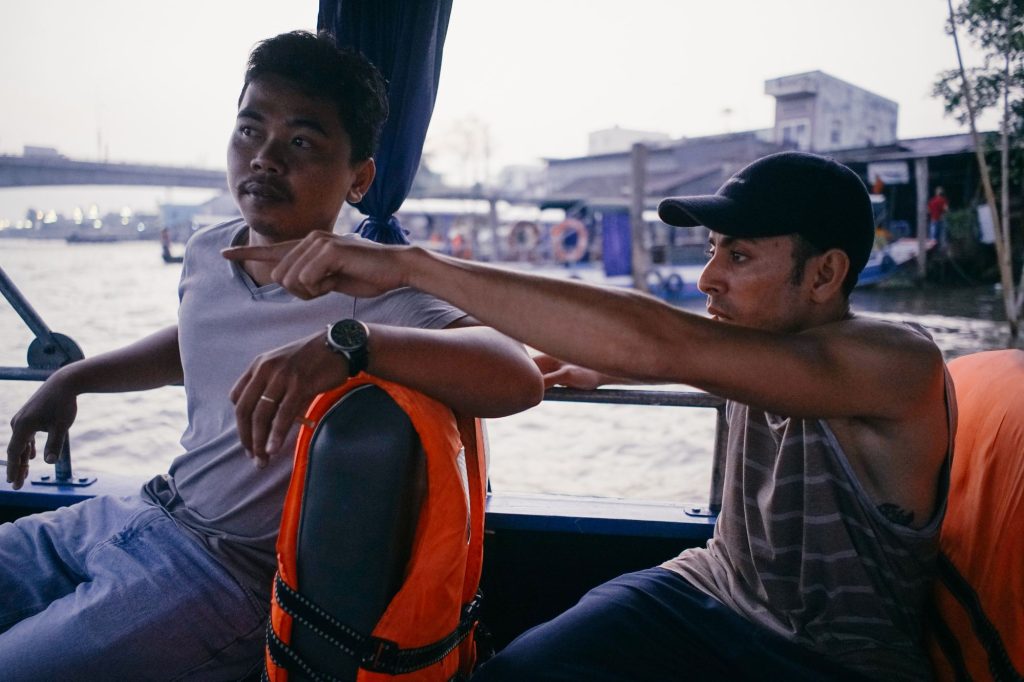 guests cruising the Hau river on a local boat — Cần Thơ Authentic Day, mekongtodo real Mekong Delta tour