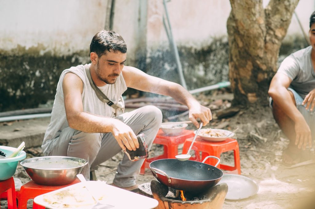 cooking class: guests preparing lunch together — Cần Thơ Authentic Day, mekongtodo real Mekong Delta tour